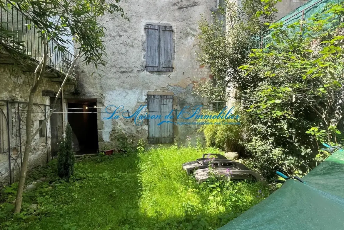 Maison de village en pierres à Lasalle avec jardin, garage et terrasse 