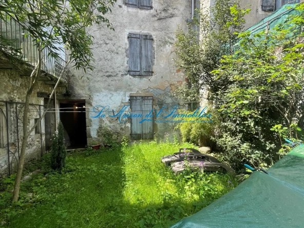 Maison de village en pierres à Lasalle avec jardin, garage et terrasse