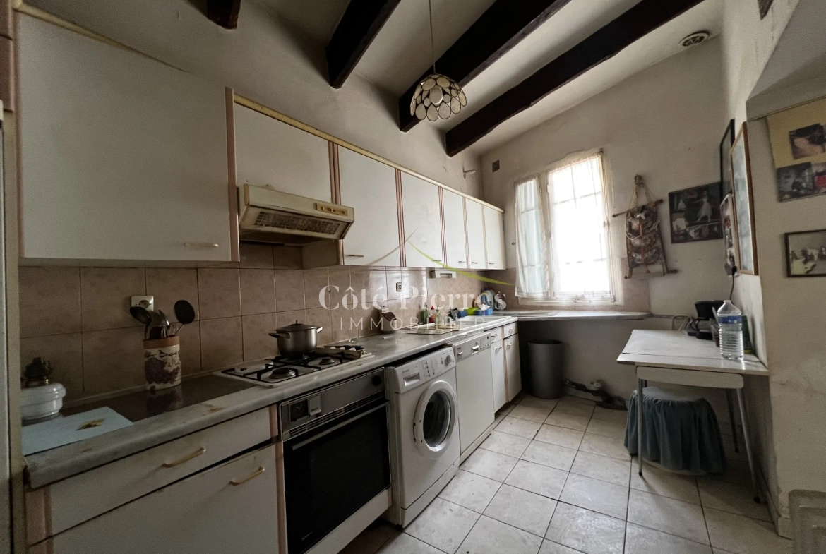 Charmante maison de village à Redessan avec grand potentiel de rénovation 
