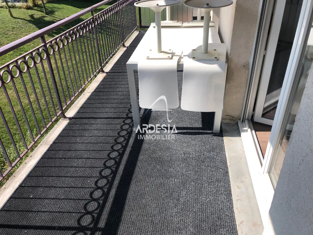 Appartement T4 de 89 m² au centre de Saint Jean de Maurienne avec balcon et parking 