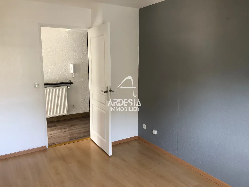 Appartement T4 de 89 m² au centre de Saint Jean de Maurienne avec balcon et parking 