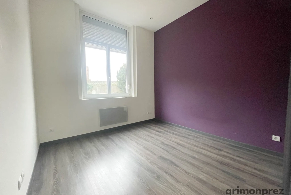 Appartement T3 spacieux avec balcon et parking à Roubaix, dans immeuble art déco 