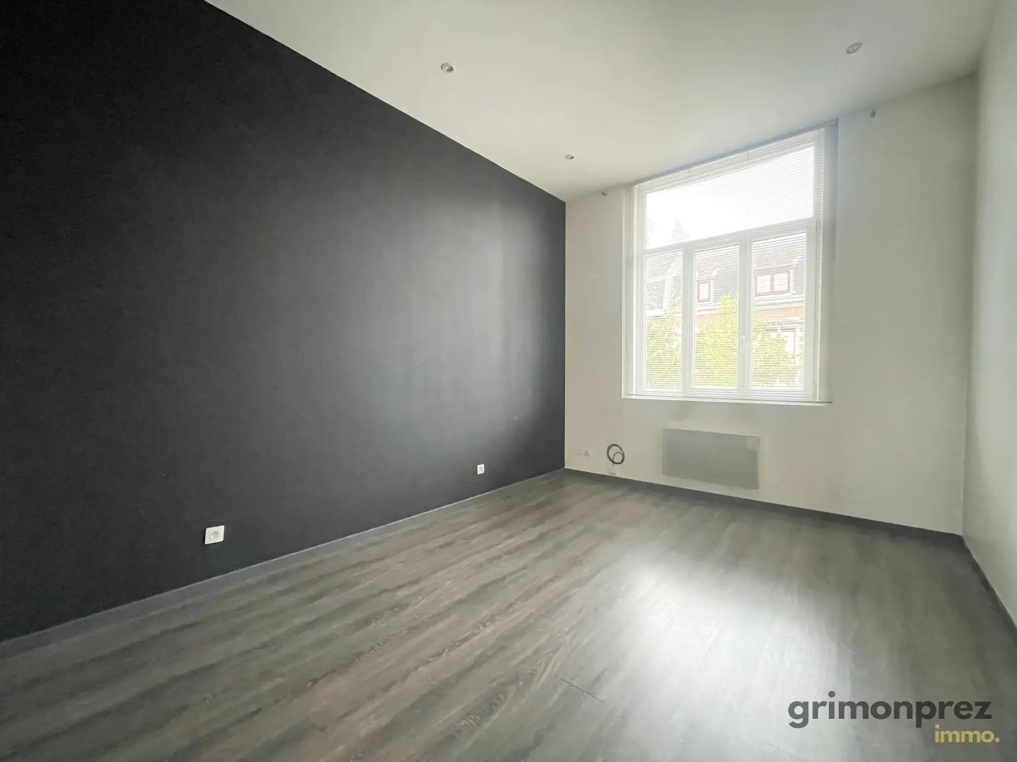Appartement T3 spacieux avec balcon et parking à Roubaix, dans immeuble art déco 