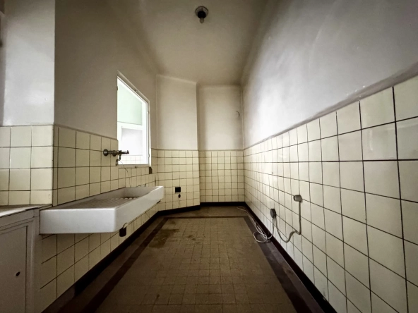 Grand appartement à vendre à Freyming-Merlebach avec terrasse et potentiel de rénovation 