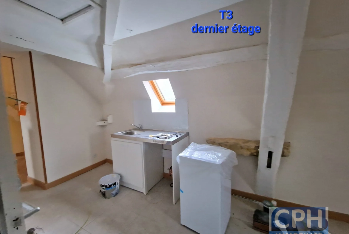 Immeuble à vendre à Trun avec fort potentiel locatif et rénovation à prévoir 
