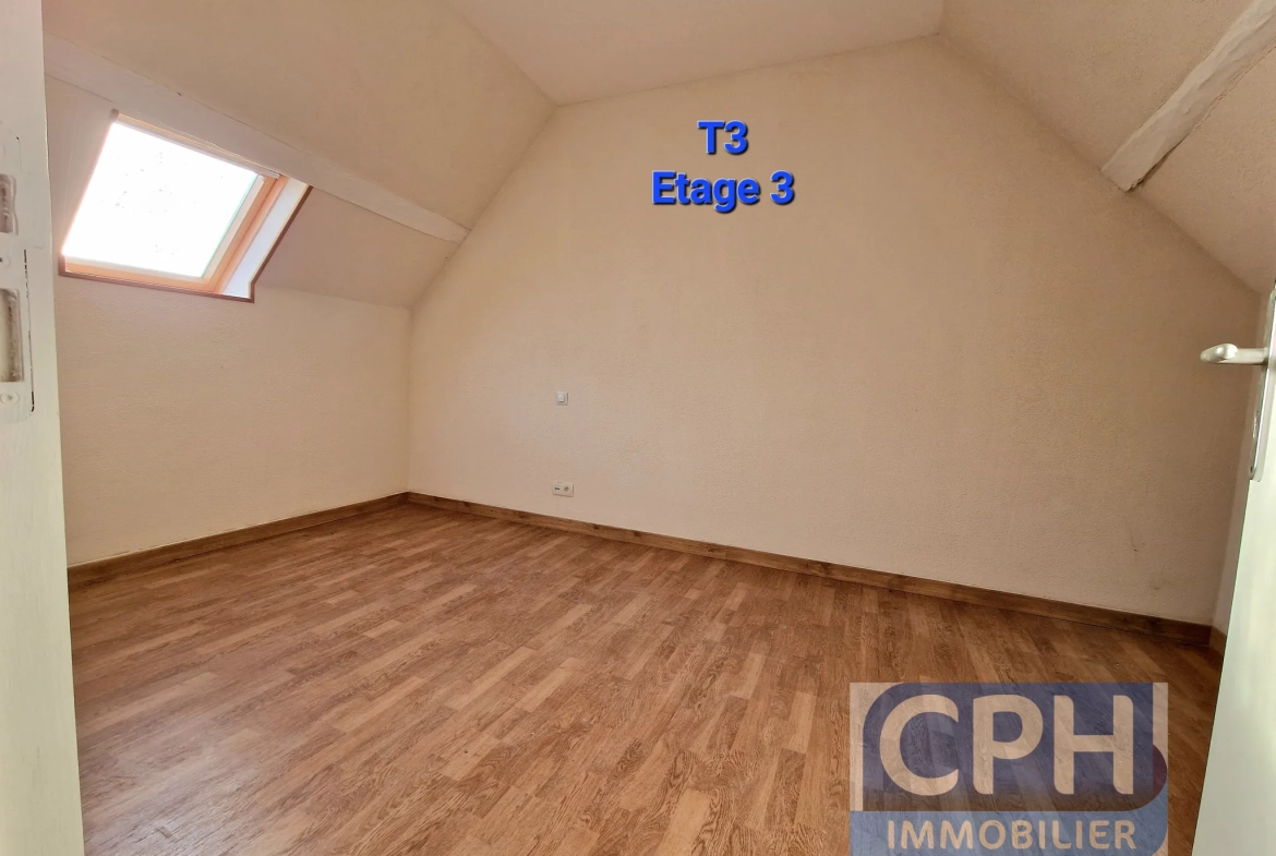 Immeuble à vendre à Trun avec fort potentiel locatif et rénovation à prévoir 
