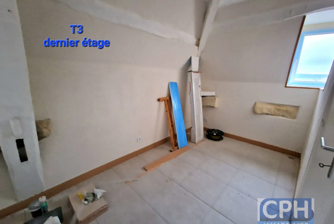 Immeuble à vendre à Trun avec fort potentiel locatif et rénovation à prévoir 