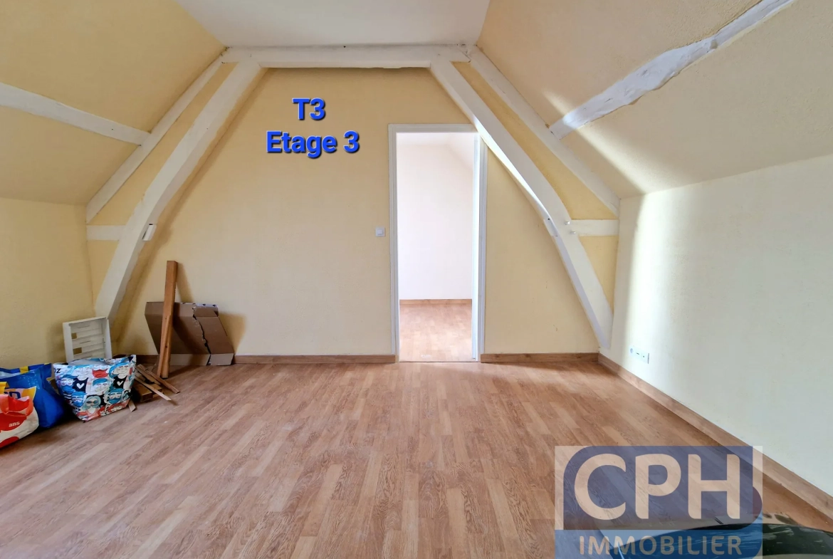 Immeuble à vendre à Trun avec fort potentiel locatif et rénovation à prévoir 