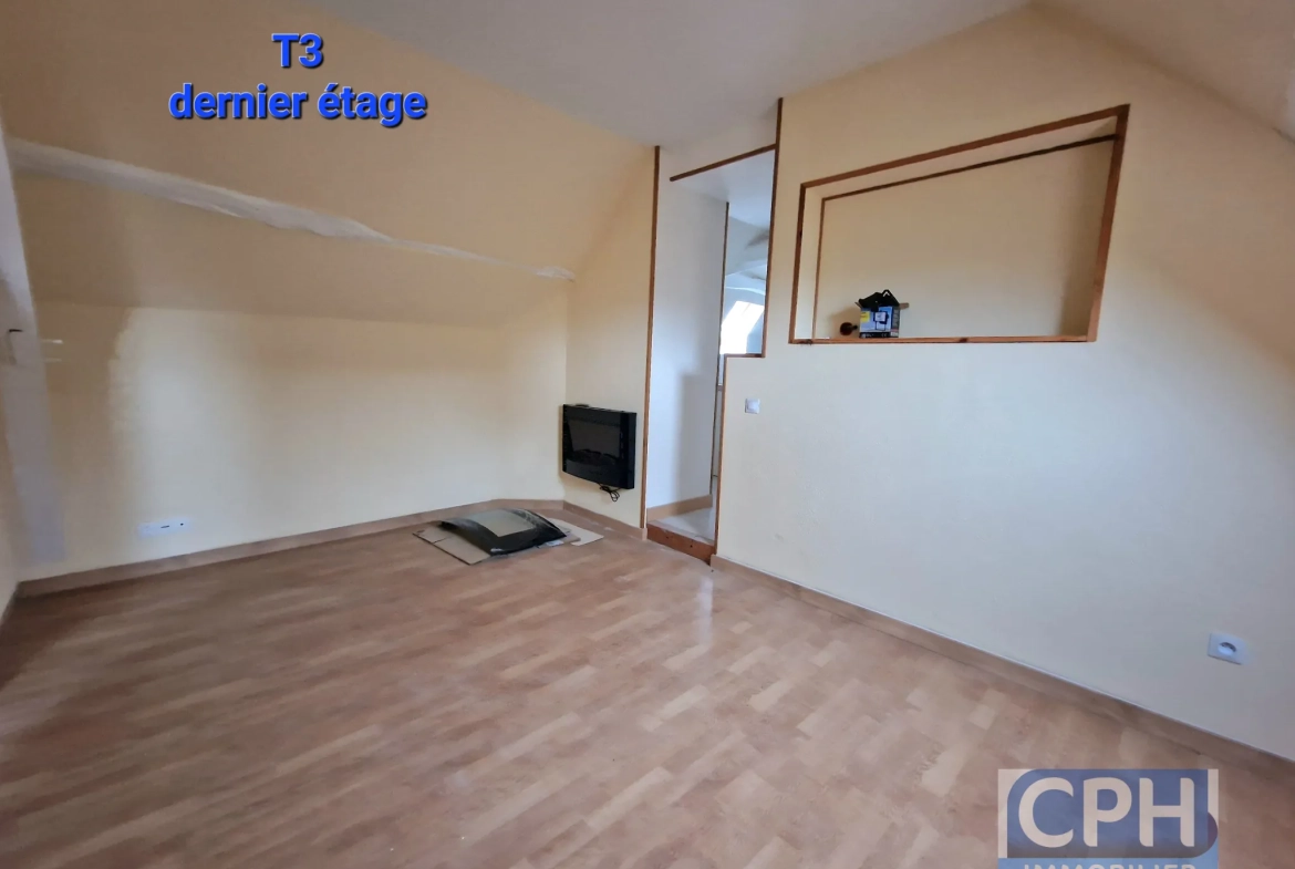 Immeuble à vendre à Trun avec fort potentiel locatif et rénovation à prévoir 