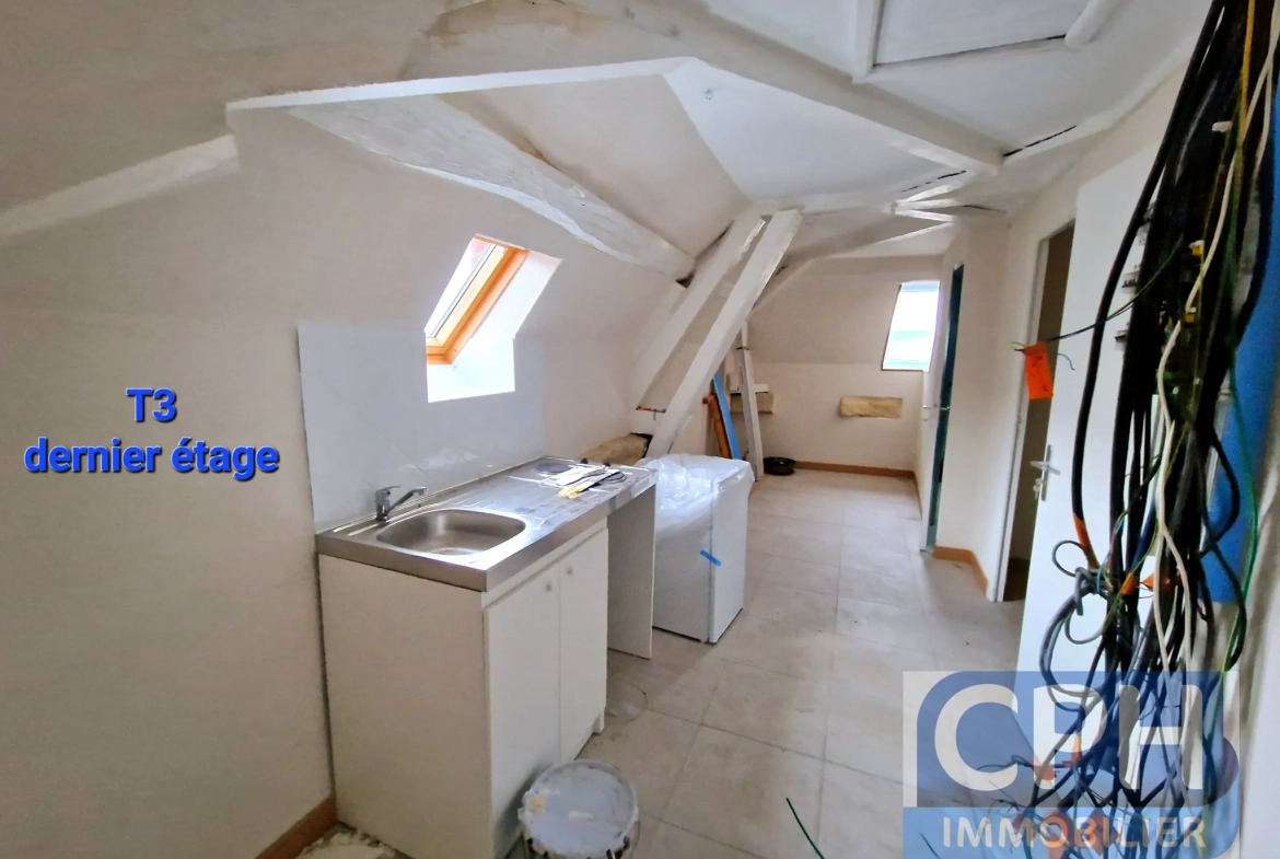 Immeuble à vendre à Trun avec fort potentiel locatif et rénovation à prévoir 