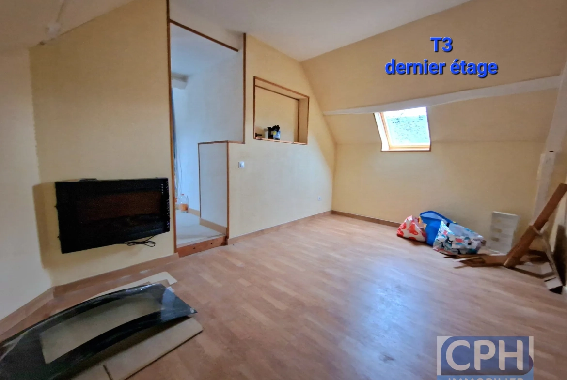 Immeuble à vendre à Trun avec fort potentiel locatif et rénovation à prévoir 