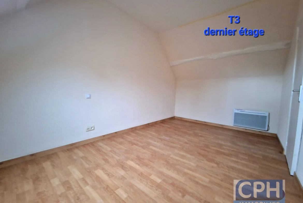 Immeuble à vendre à Trun avec fort potentiel locatif et rénovation à prévoir 
