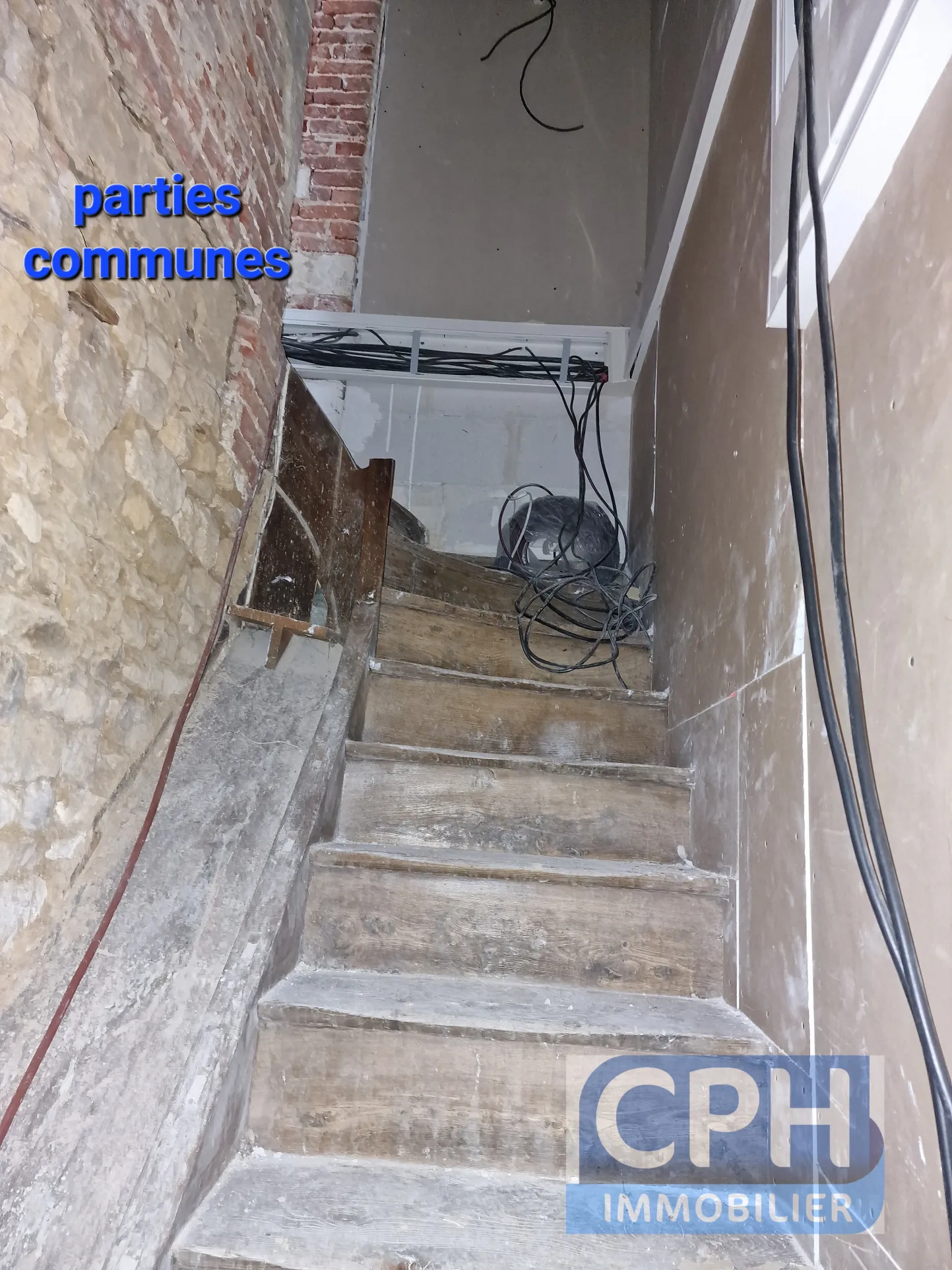 Immeuble à vendre à Trun avec fort potentiel locatif et rénovation à prévoir 
