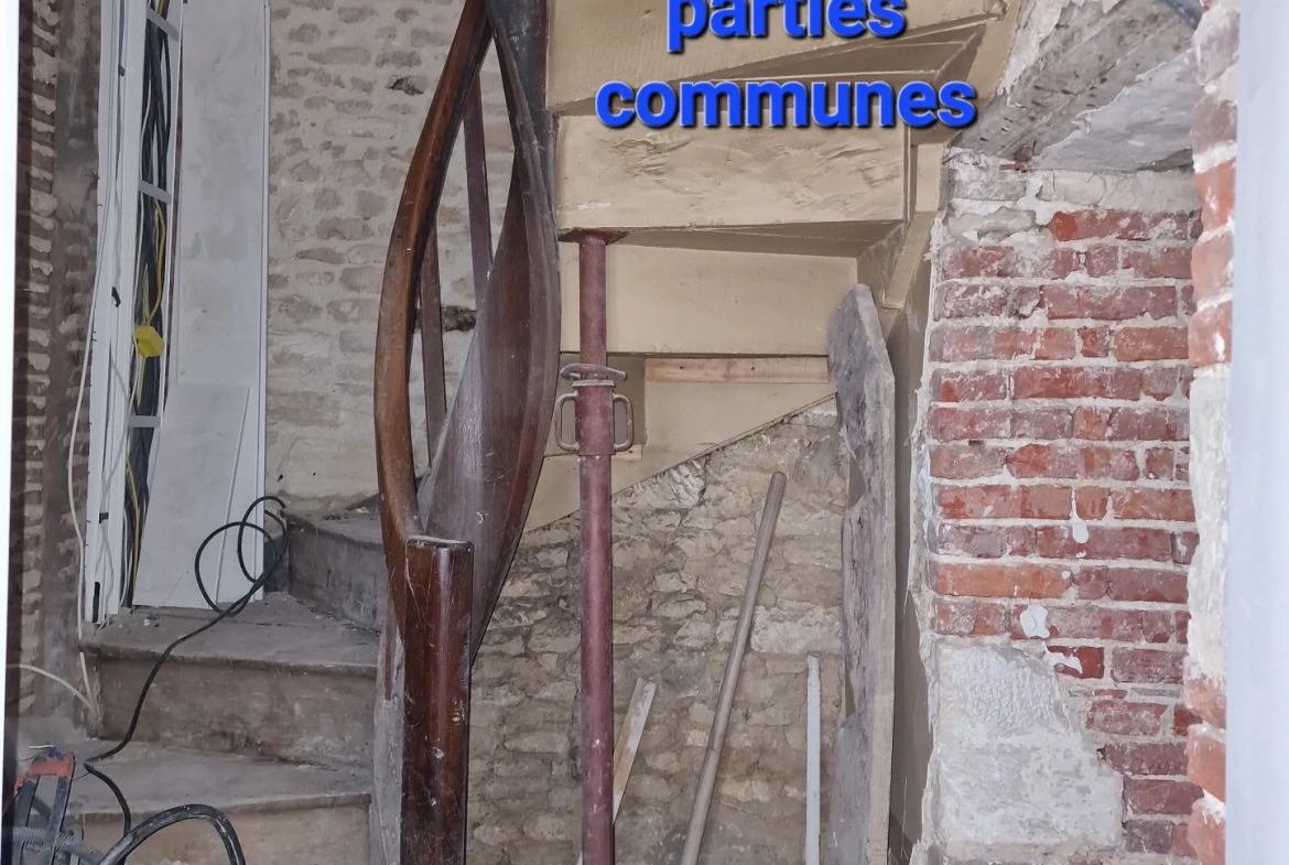 Immeuble à vendre à Trun avec fort potentiel locatif et rénovation à prévoir 