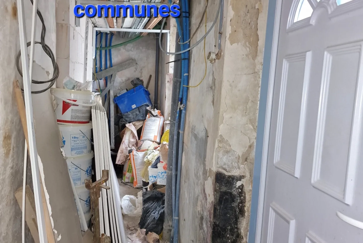 Immeuble à vendre à Trun avec fort potentiel locatif et rénovation à prévoir 