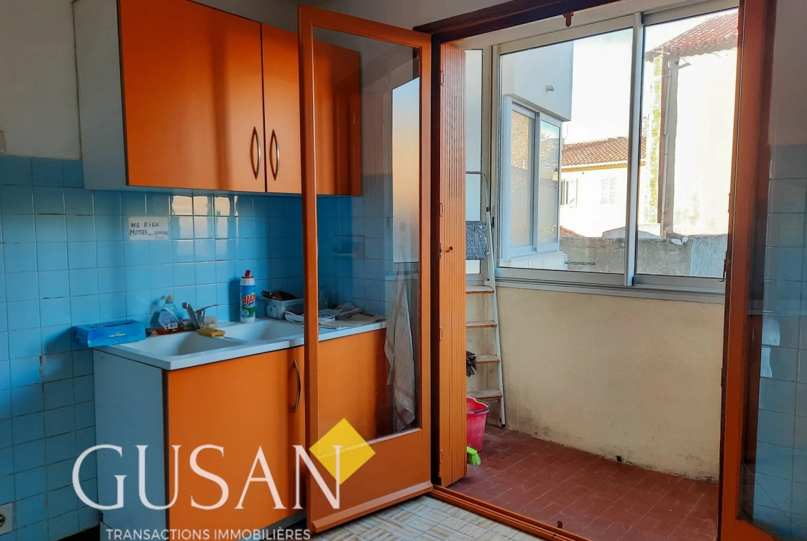 Appartement T4 à vendre à Toulon avec balcon et stationnement - Agence Gusan 
