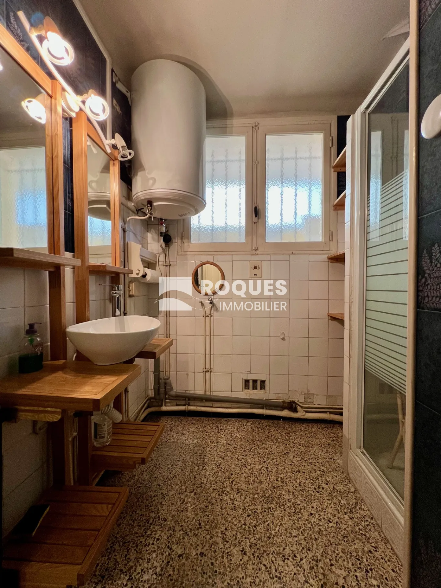 Appartement T4 à Millau avec balcon, cave et parking, idéal pour rénovateur 
