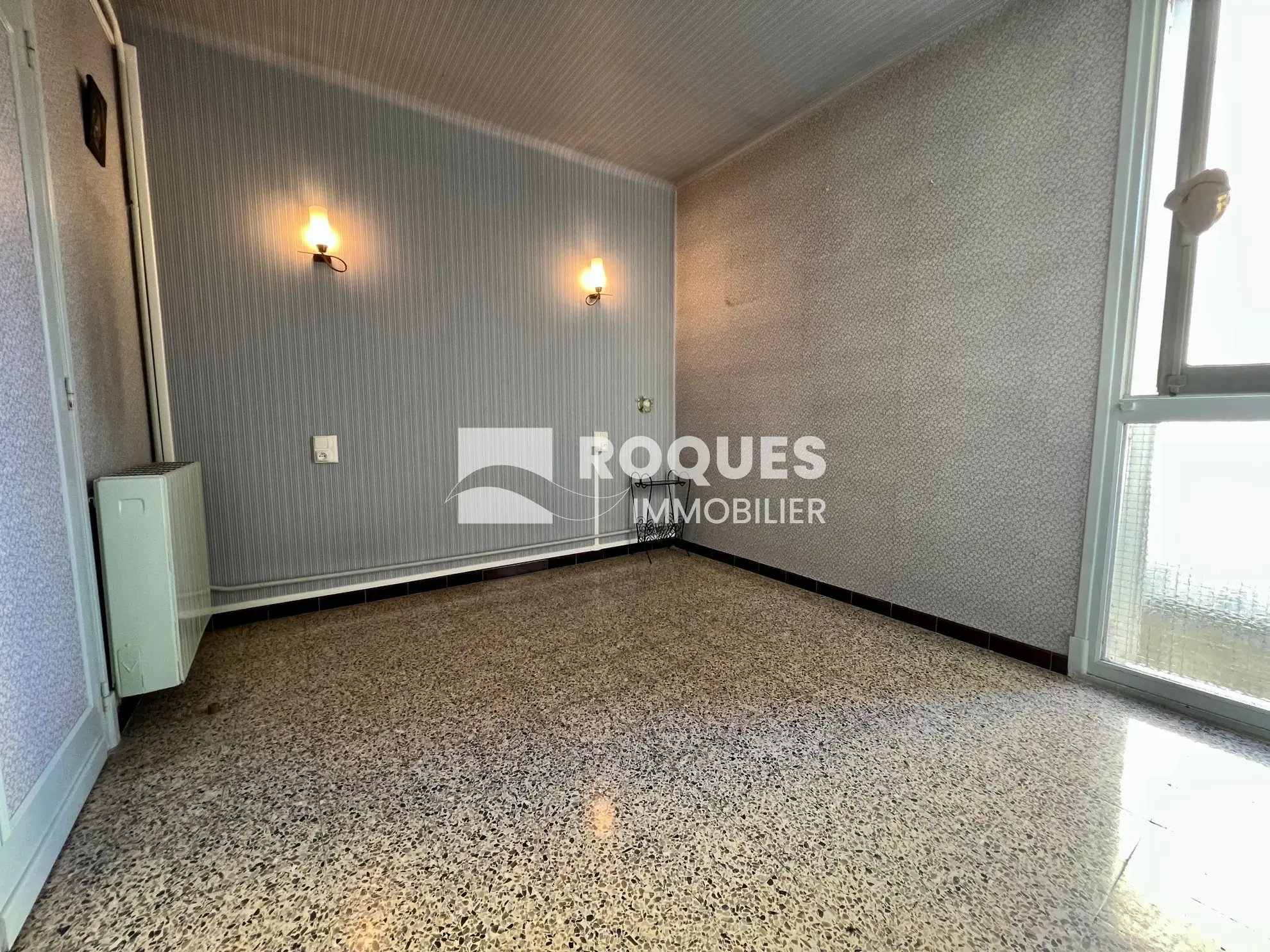 Appartement T4 à Millau avec balcon, cave et parking, idéal pour rénovateur 