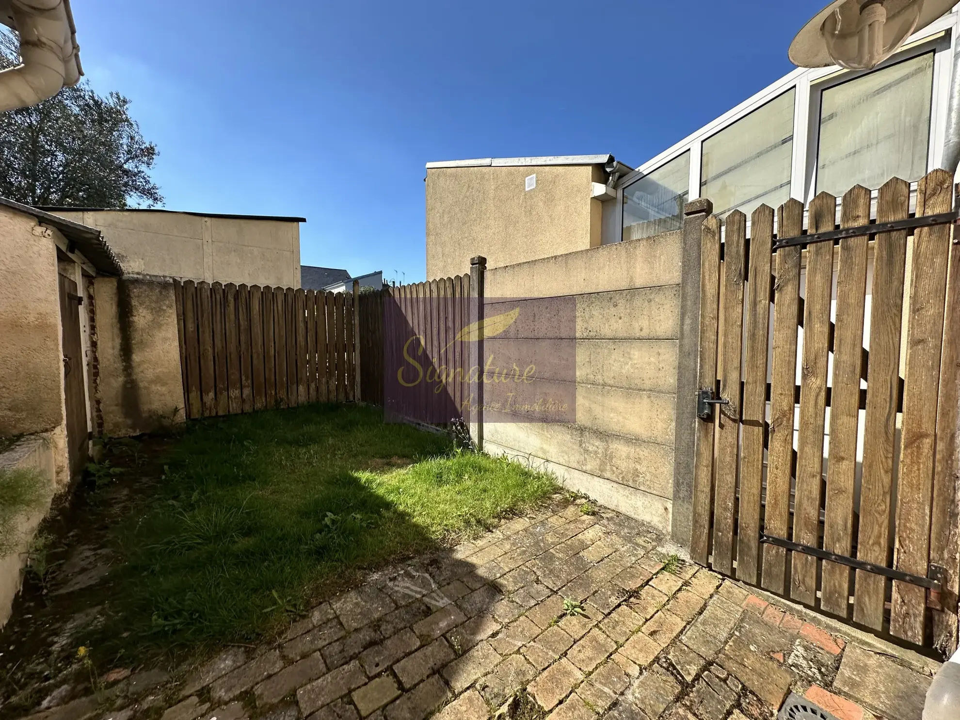 Maison à vendre à Saint Pavin Le Mans avec potentiel d'aménagement et jardin 