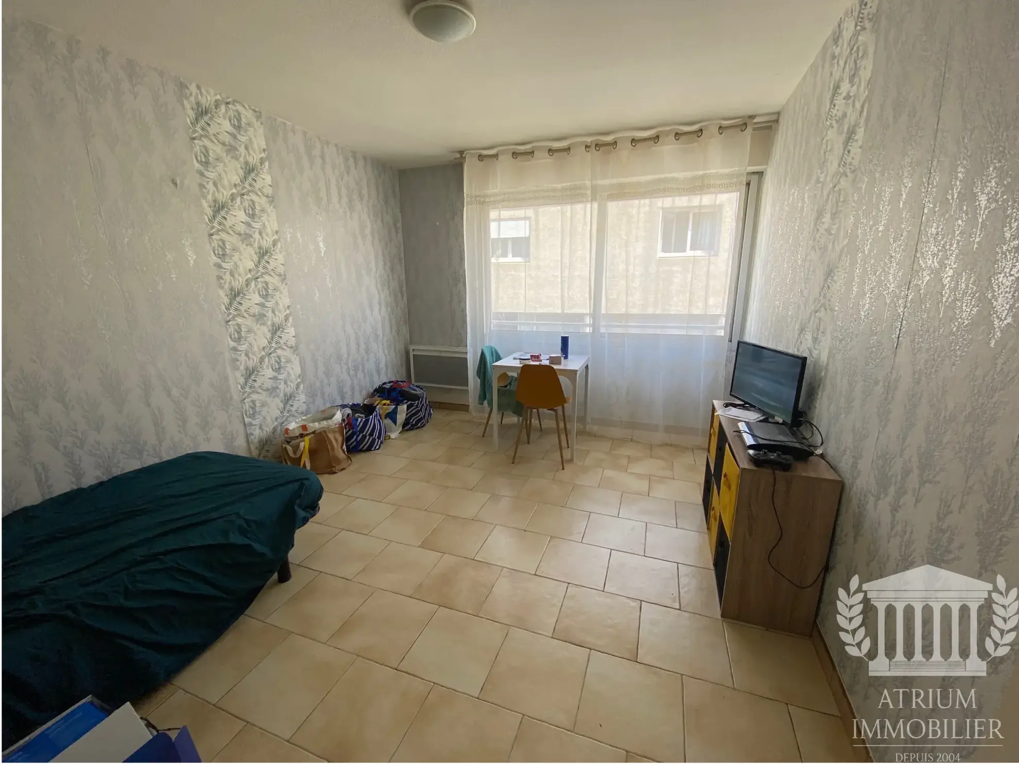 Studio à Nîmes de 23 m² loué, emplacement privilégié – Investissement sûr 