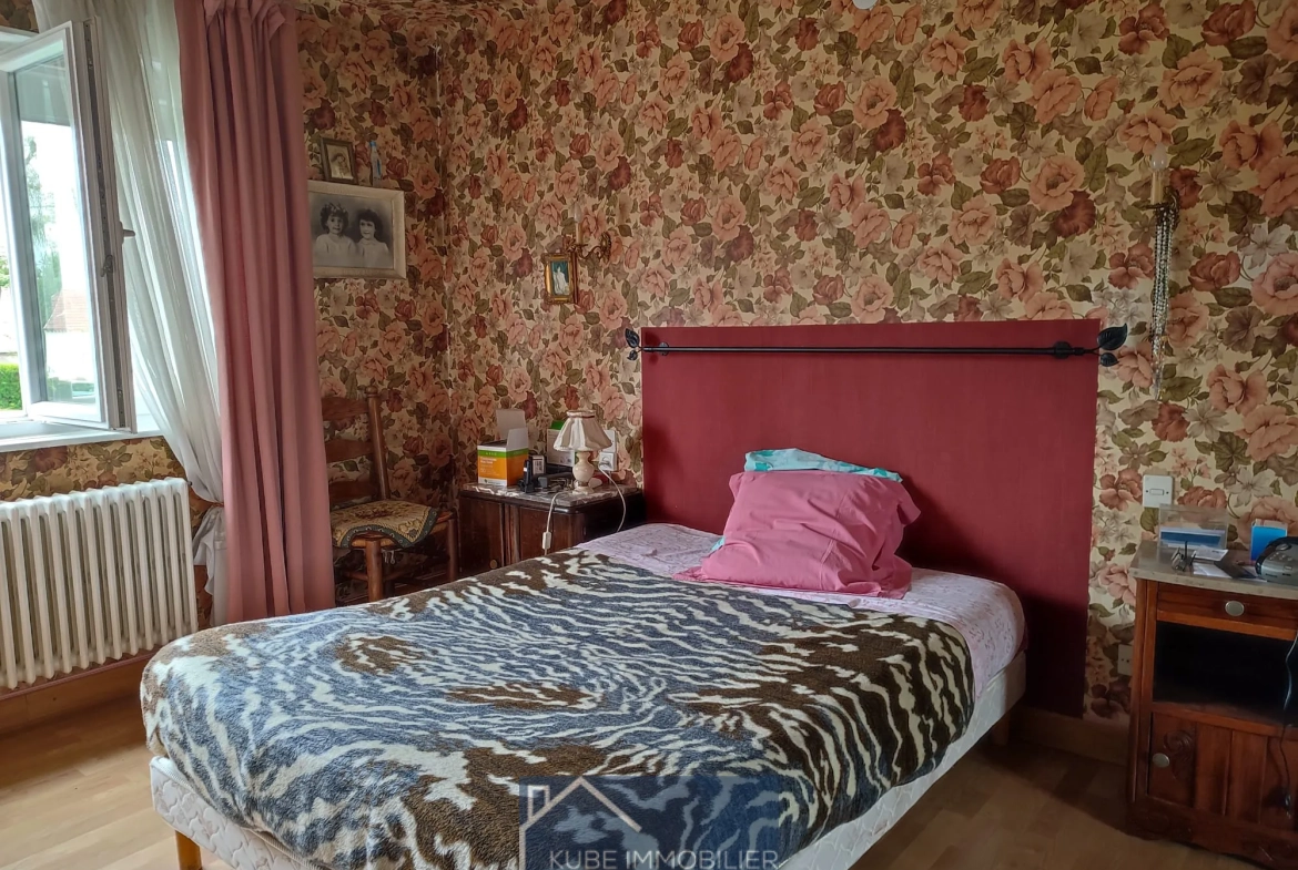 Maison 4 chambres à vendre à Remilly - 89 m² avec garage et terrasse 
