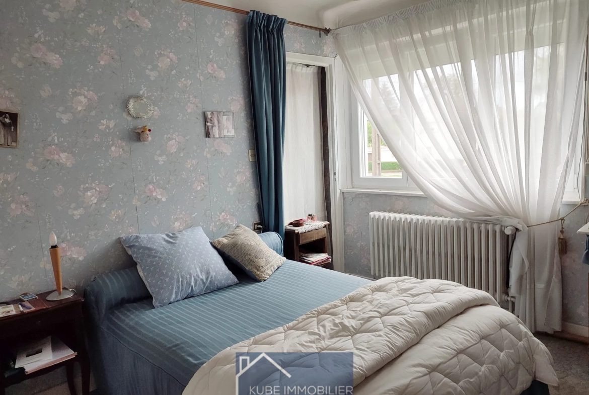 Maison 4 chambres à vendre à Remilly - 89 m² avec garage et terrasse 