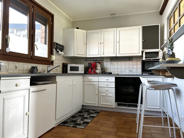 Maison individuelle à Henin Beaumont avec terrasse, 3 chambres et sous-sol spacieux 