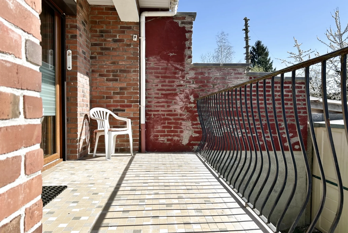 Maison individuelle à Henin Beaumont avec terrasse, 3 chambres et sous-sol spacieux 