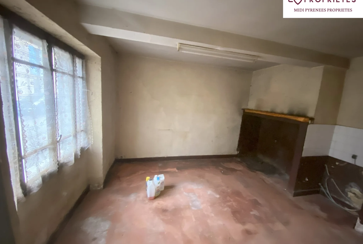 Maison de village à rénover à L Isle en Dodon, proche rivière et commerces 
