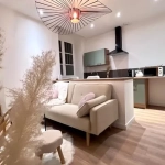 Appartement T2 rénové à Lons-le-Saunier, locataire en place – Investissement sûr