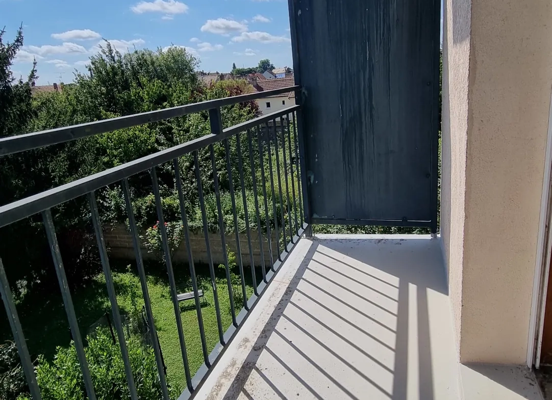 Appartement à vendre à Sens, proche centre-ville et gare, avec balcon et parking couvert 