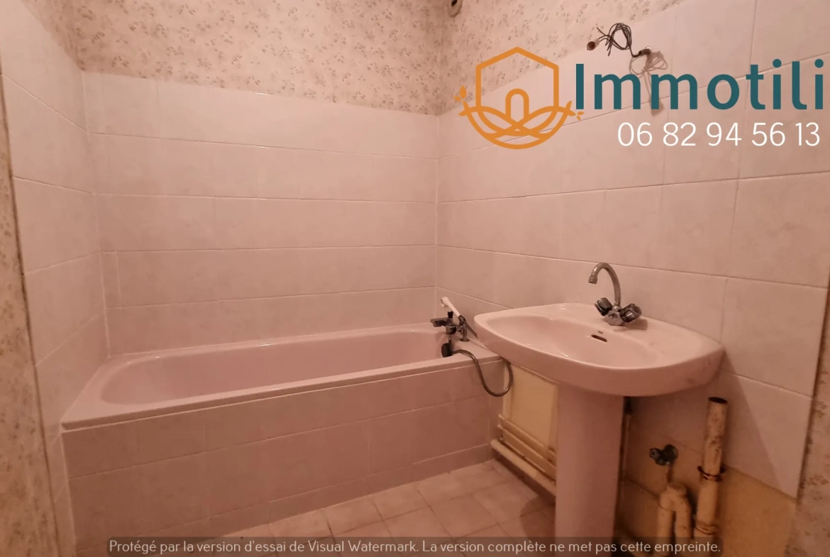 Appartement à vendre à Sens, proche centre-ville et gare, avec balcon et parking couvert 