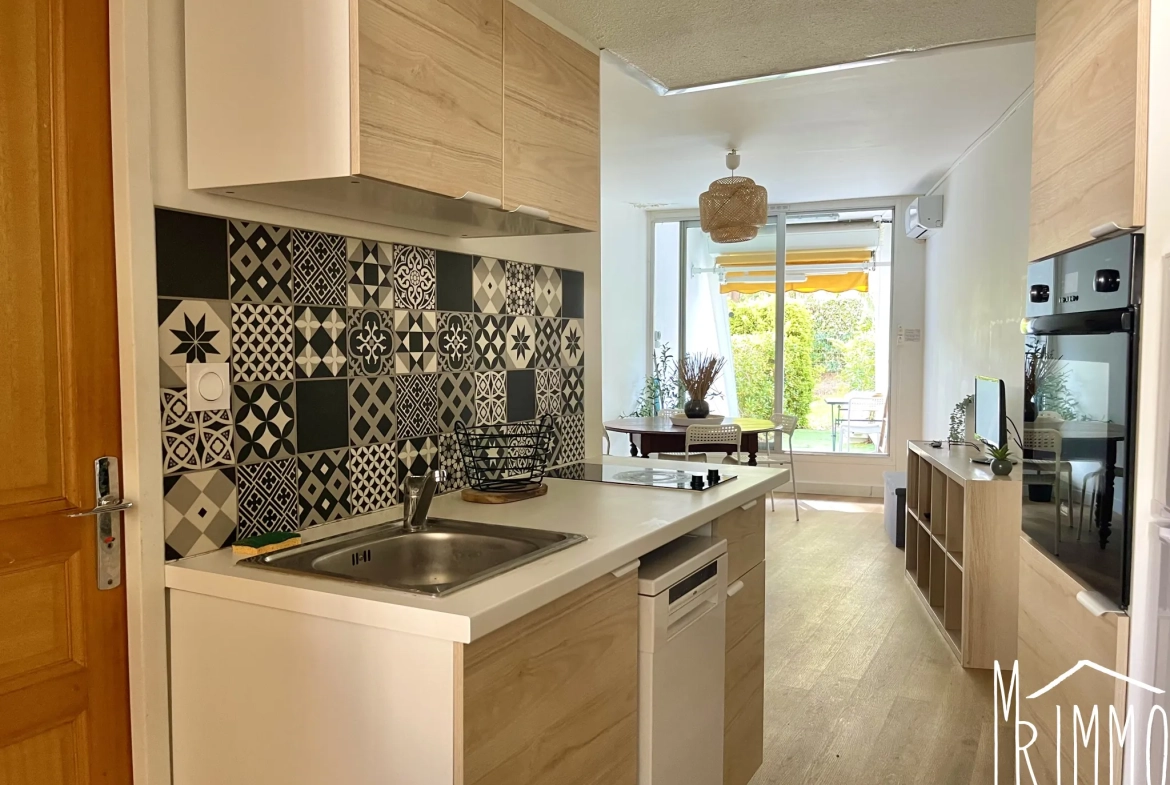 Charmant appartement T3 en rez-de-jardin à La Grande-Motte avec parking et terrasse 