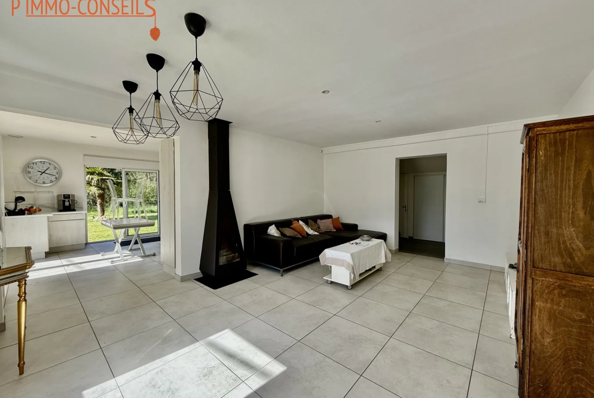 Maison 3 chambres à Héric avec jardin, garage et potentiel d'aménagement 