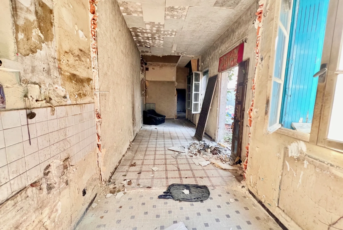 Immeuble à rénover à Tarbes – Opportunité d'investissement dans le centre-ville 
