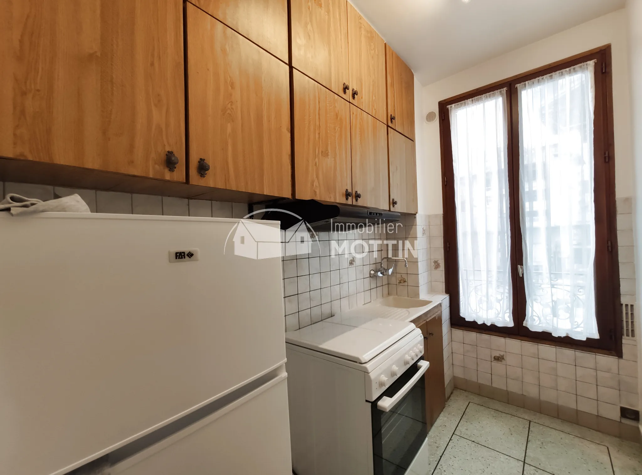 Appartement F2 de 30 m² à Ivry-sur-Seine proche transports et jardin 
