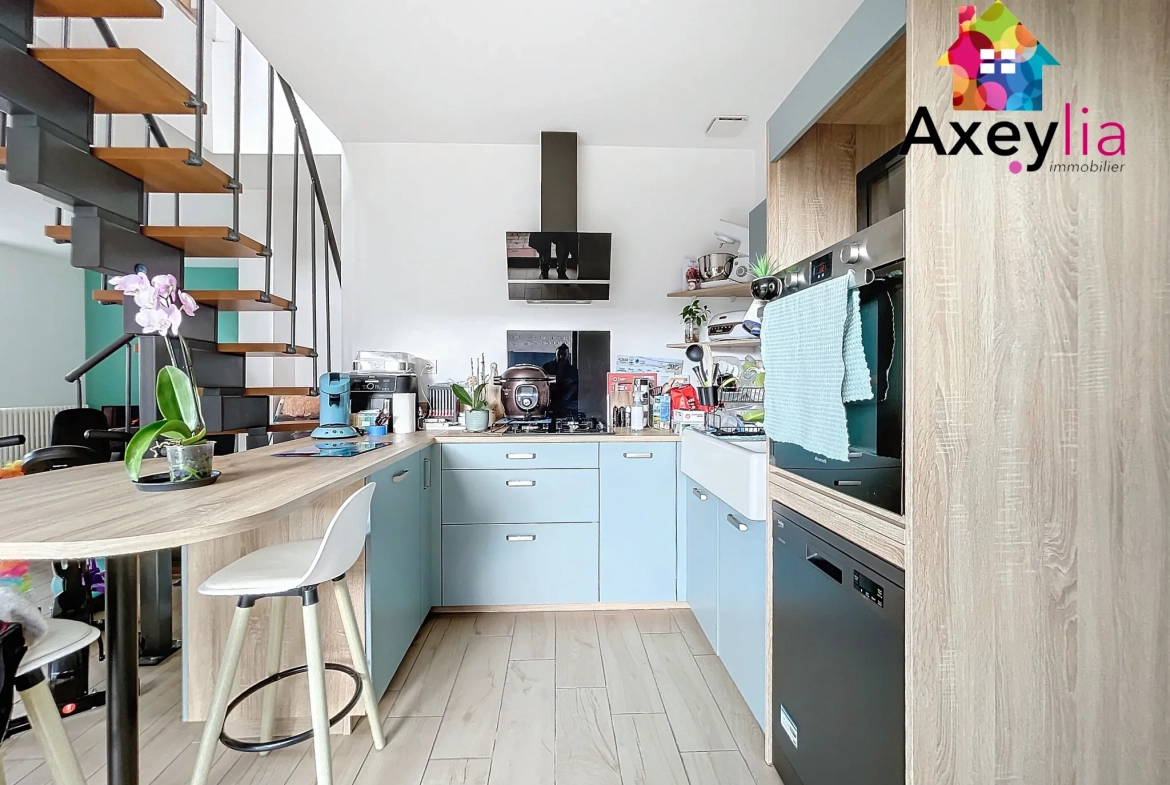 À vendre maison rénovée avec 4 chambres, garage et terrasse à Cuinzier 