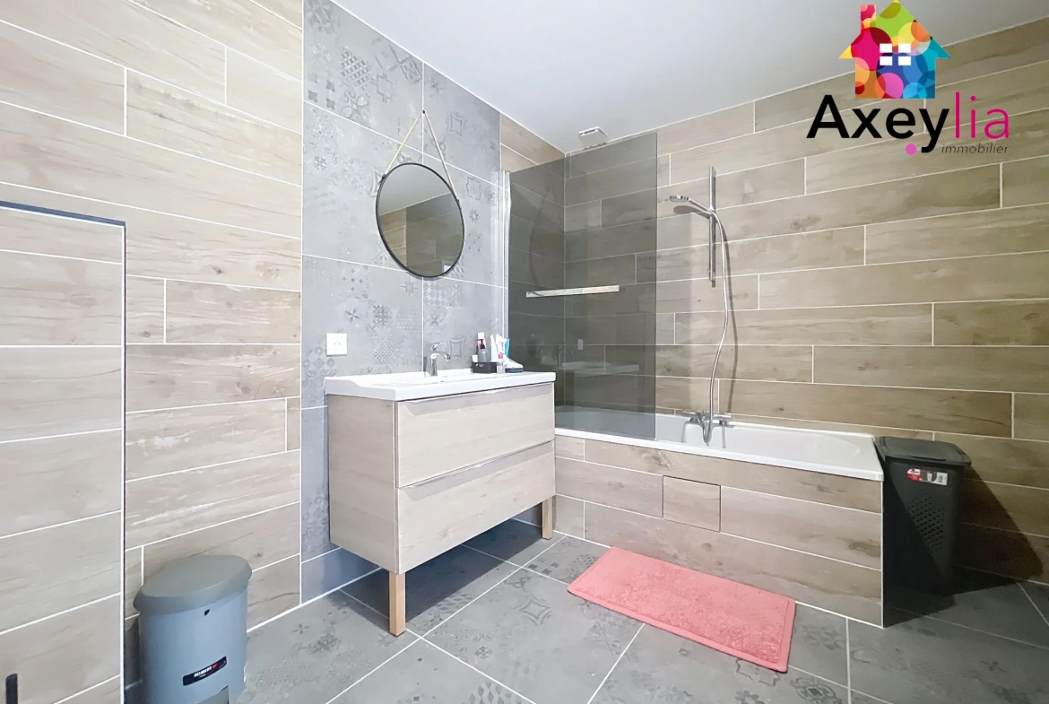 À vendre maison rénovée avec 4 chambres, garage et terrasse à Cuinzier 