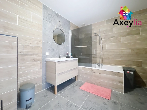 À vendre maison rénovée avec 4 chambres, garage et terrasse à Cuinzier 