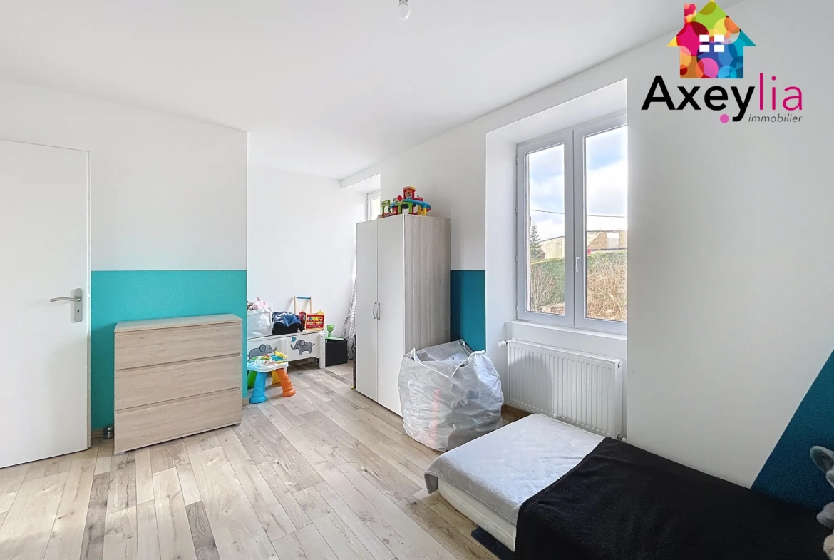 À vendre maison rénovée avec 4 chambres, garage et terrasse à Cuinzier 