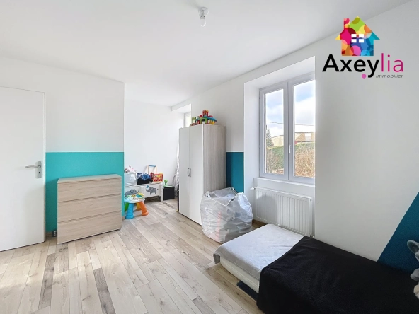 À vendre maison rénovée avec 4 chambres, garage et terrasse à Cuinzier 