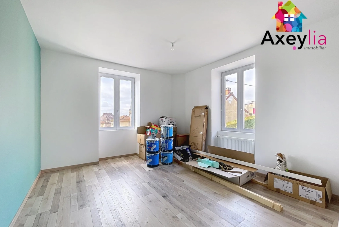 À vendre maison rénovée avec 4 chambres, garage et terrasse à Cuinzier 