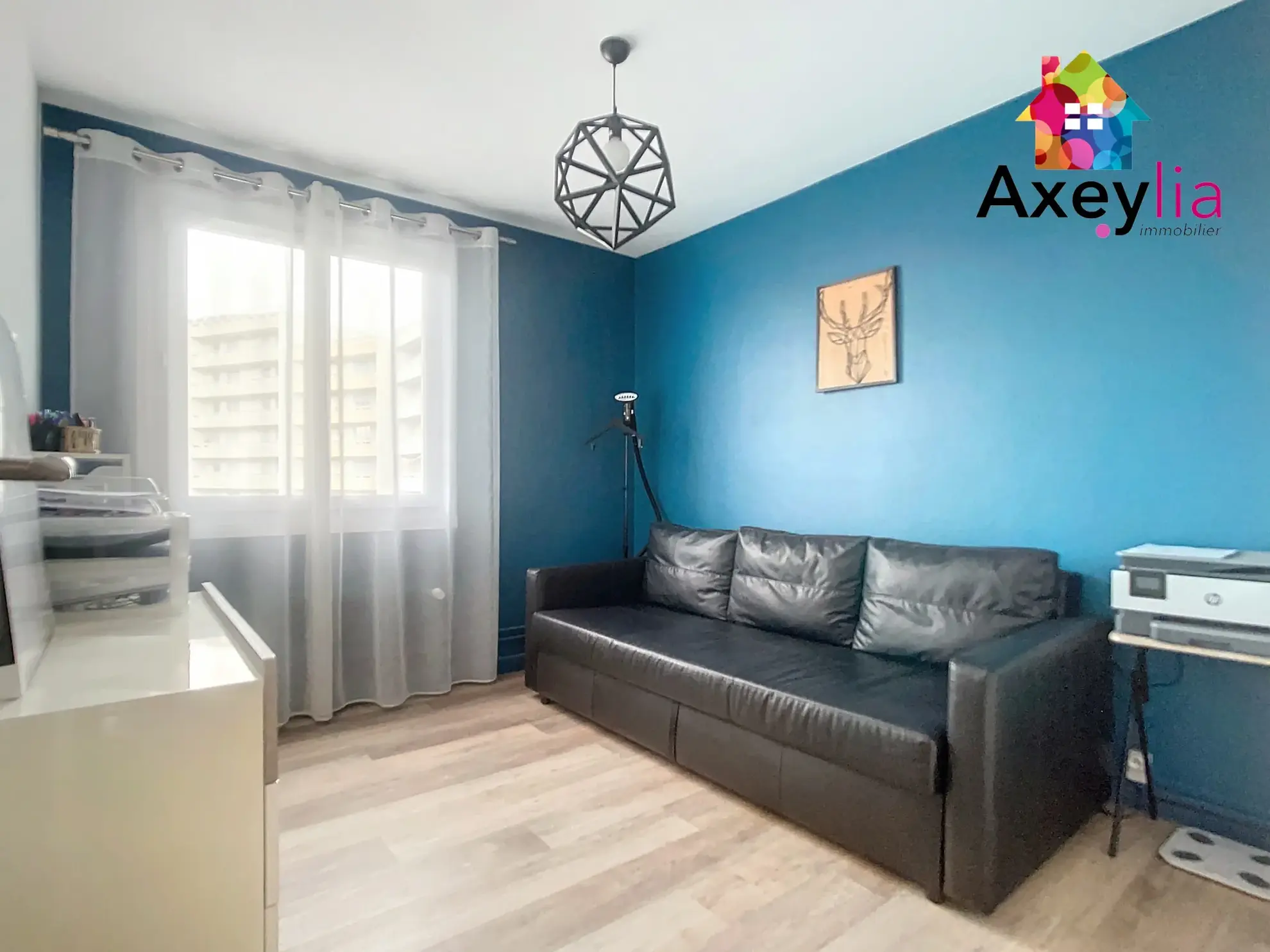 Appartement T3 rénové avec balcon, garage et cave à Roanne 