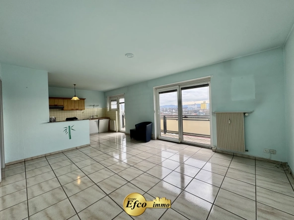Vente d'un appartement T3 lumineux avec balcon à Huningue proche de Bâle 
