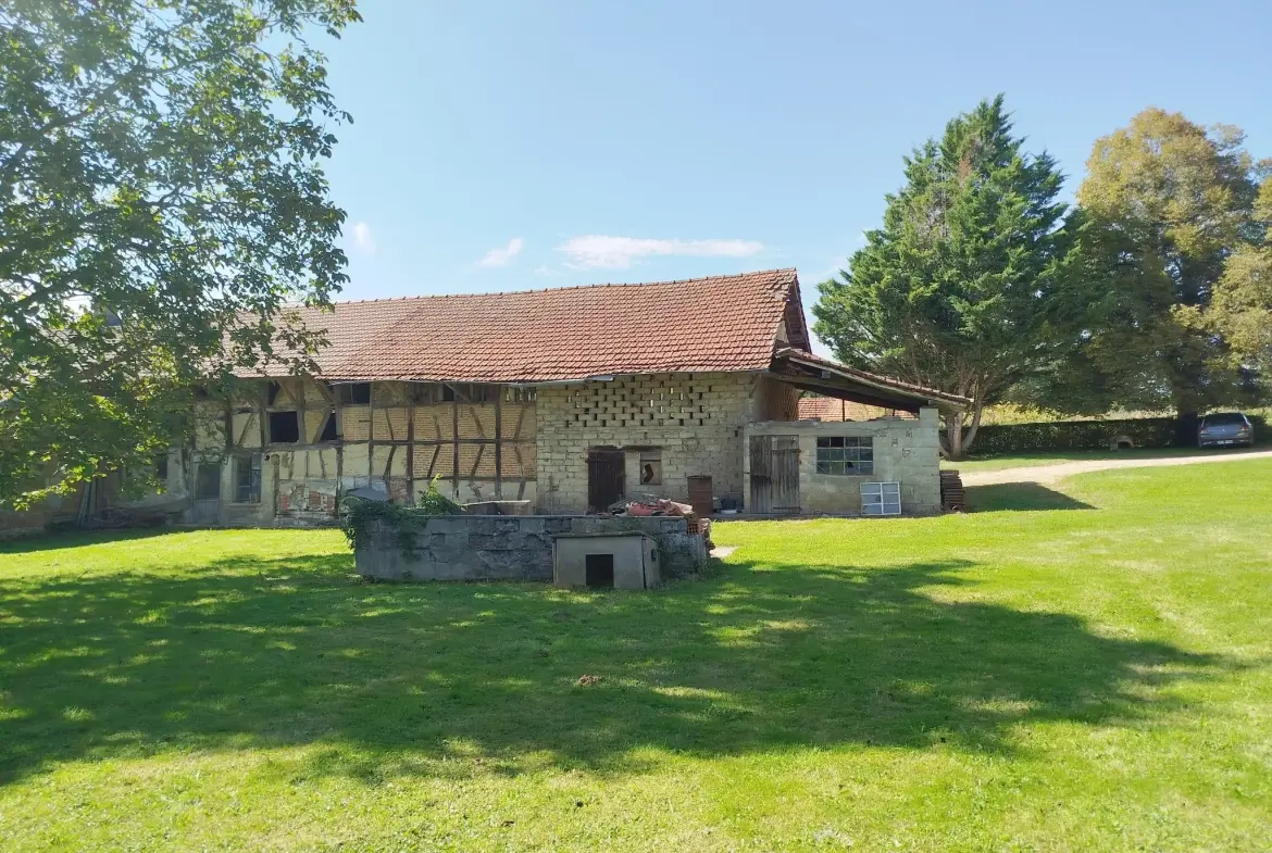 Villa 106 m² de plain-pied avec dépendances à Saint Trivier de Courtes 