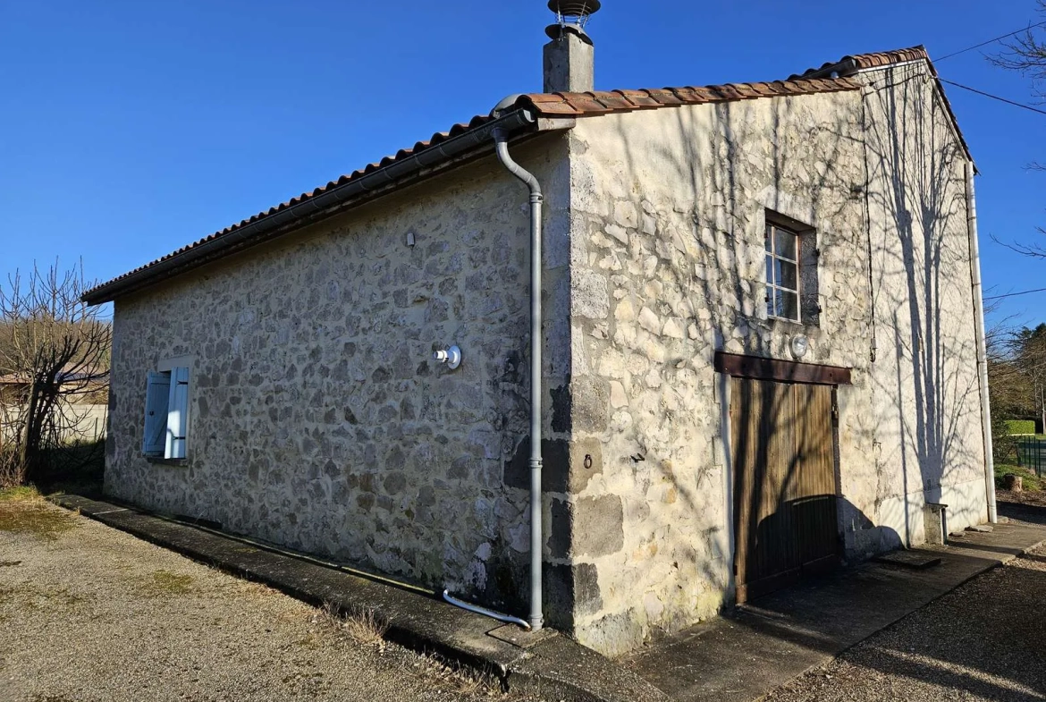 Maison en pierre de 98 m² avec terrain à Lavardac (47) - 3 chambres, garage et vie de plain-pied 