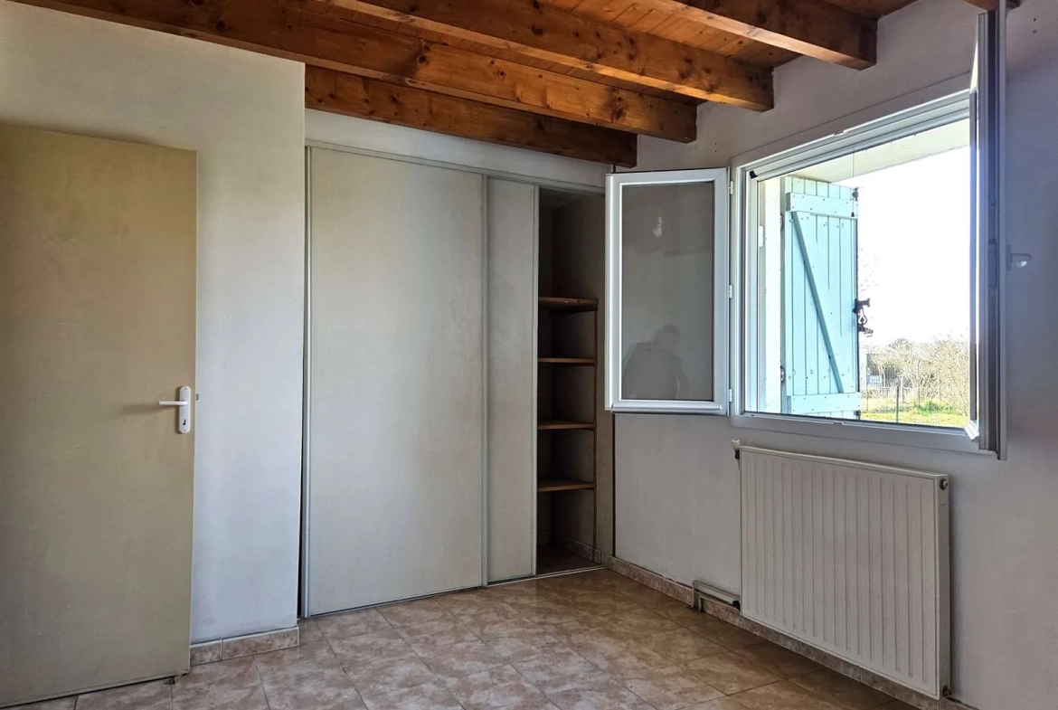 Maison en pierre de 98 m² avec terrain à Lavardac (47) - 3 chambres, garage et vie de plain-pied 