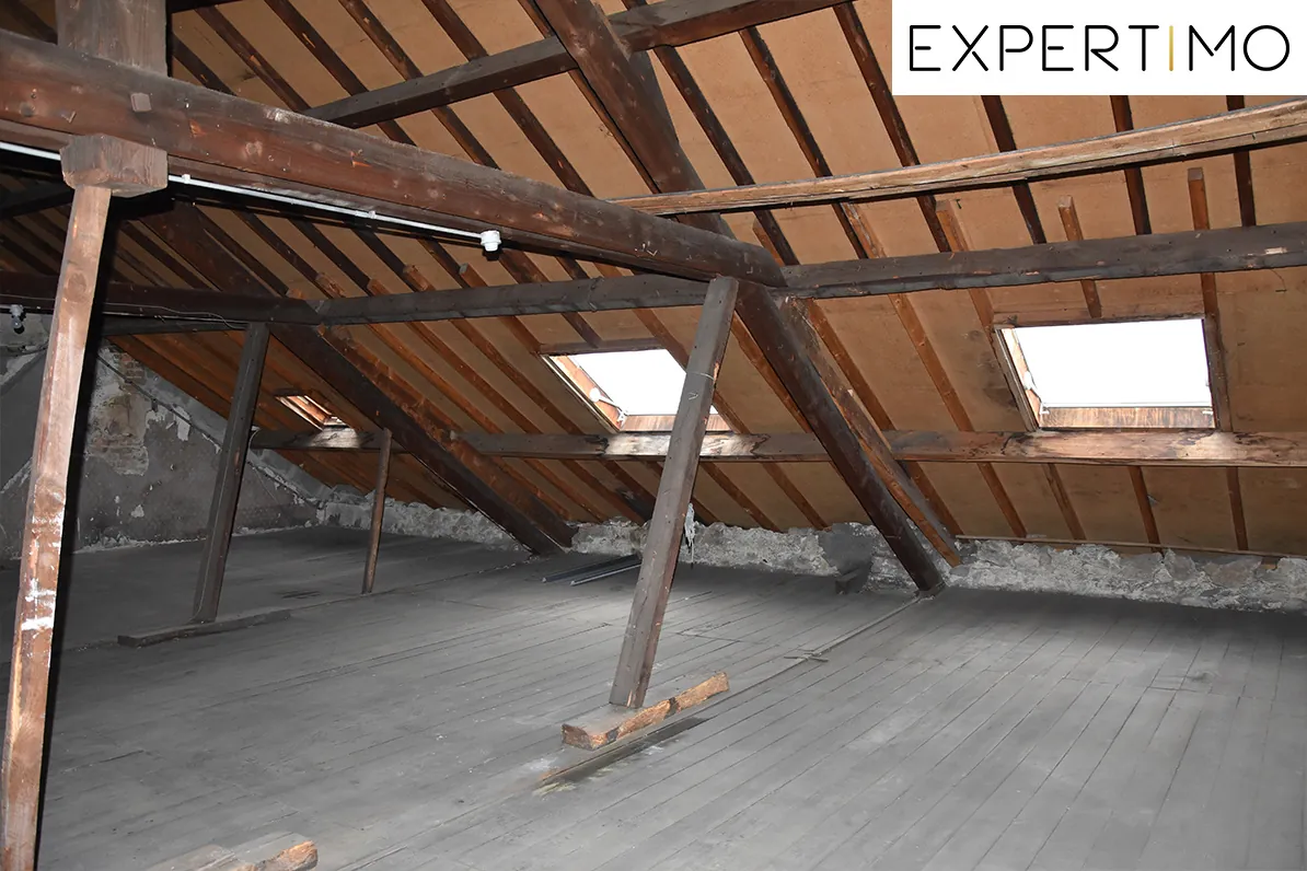 Ancien local commercial à Saint Eloy-les-Mines avec possibilités d’aménagement – Prix attractif 
