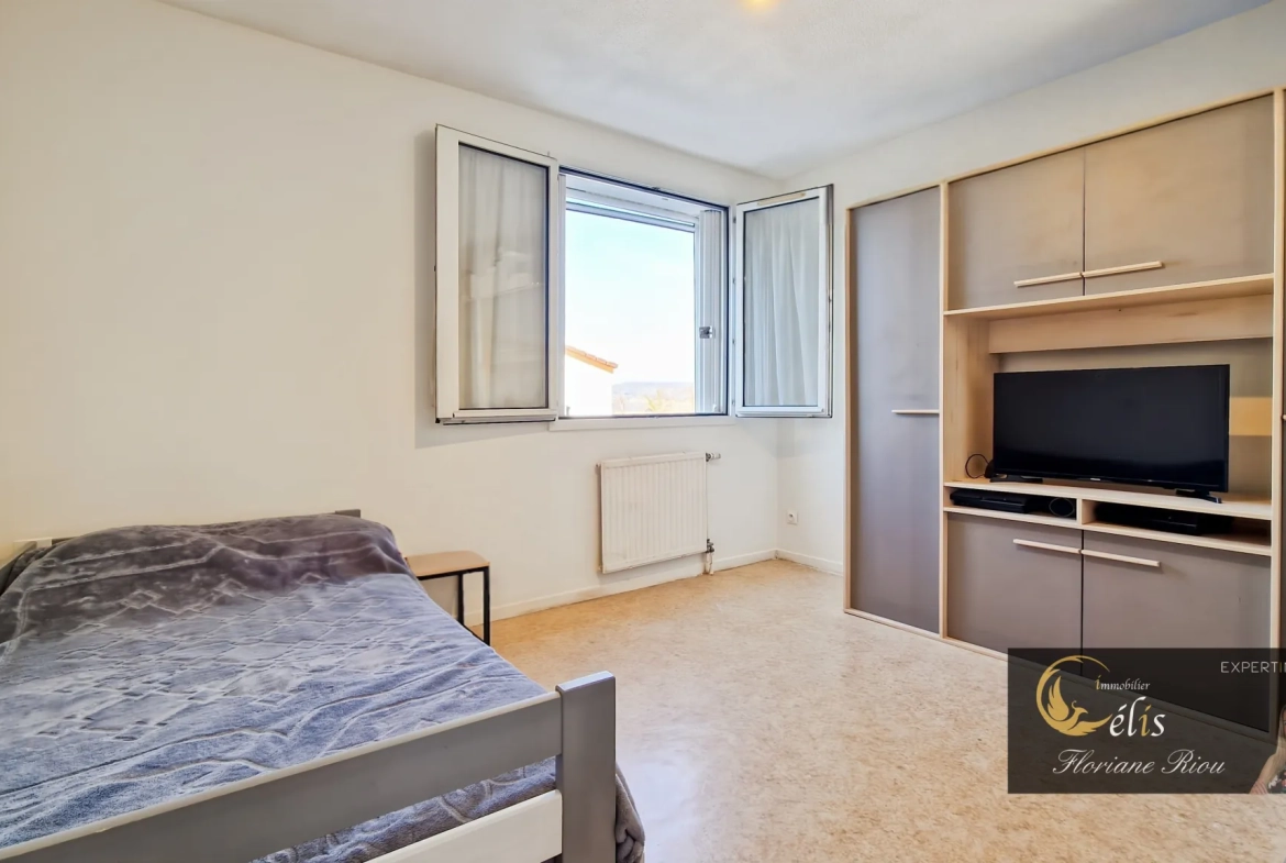 Maison familiale de 105 m² avec jardin à l'Isle d'Abeau, faible consommation énergétique 