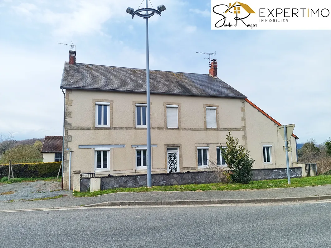 Maison avec deux appartements et dépendances à Saint Eloy-les-Mines 